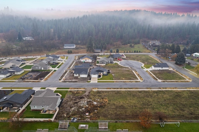 view of aerial view at dusk