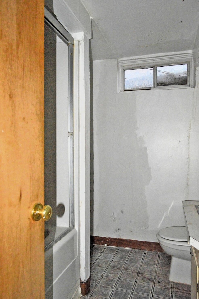 full bathroom featuring toilet, shower / tub combination, and vanity