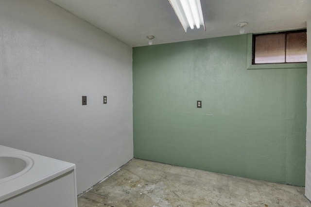 bathroom featuring concrete flooring