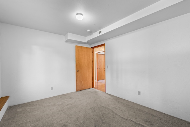 unfurnished room with carpet