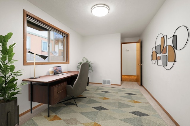 office space with light carpet