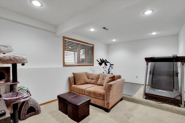 bedroom with a closet, light hardwood / wood-style floors, and ceiling fan