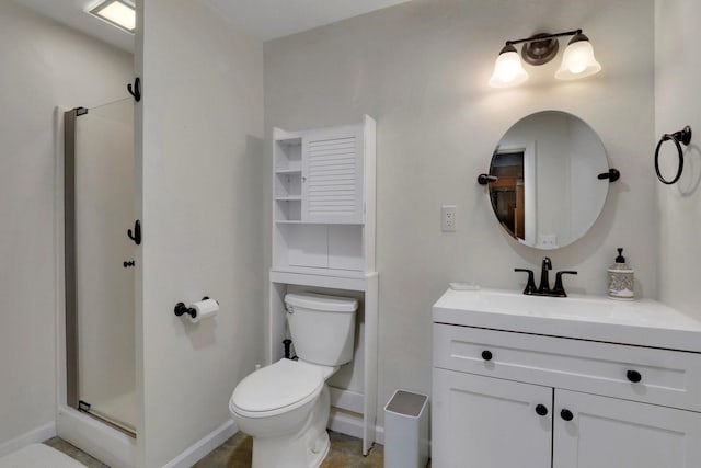 bathroom with vanity and a shower with door