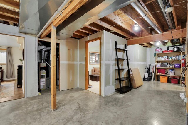 carpeted living room with a textured ceiling