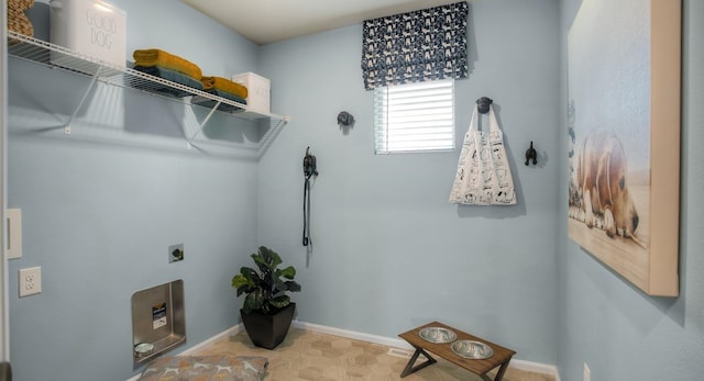 laundry room featuring hookup for an electric dryer