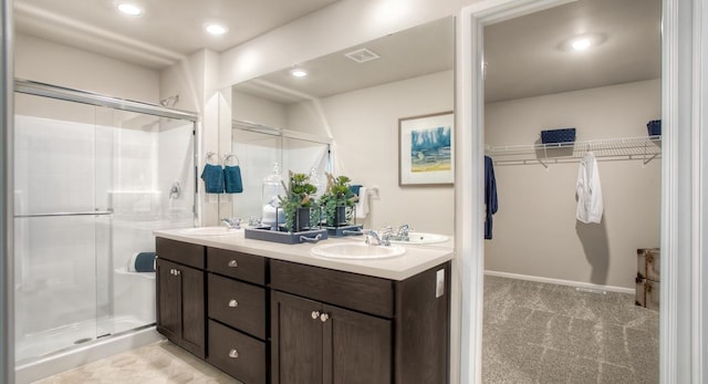 bathroom featuring vanity and walk in shower