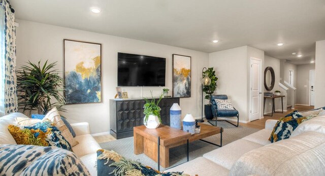 living room with light hardwood / wood-style flooring