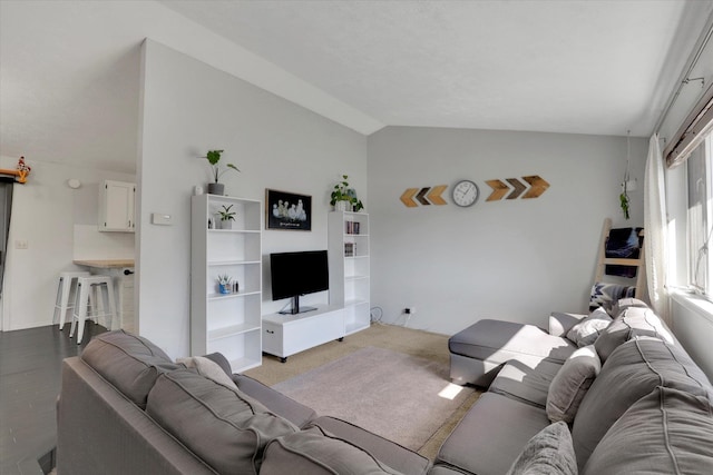 living room with vaulted ceiling