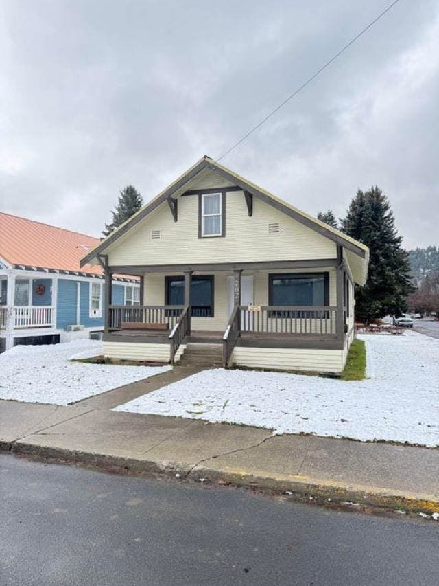 bungalow-style home with a porch