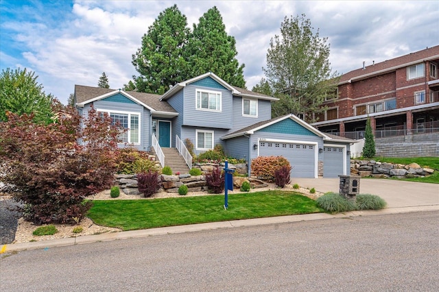 view of front of house with a front lawn and a garage