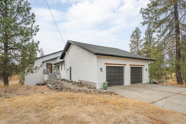 view of property exterior with a garage