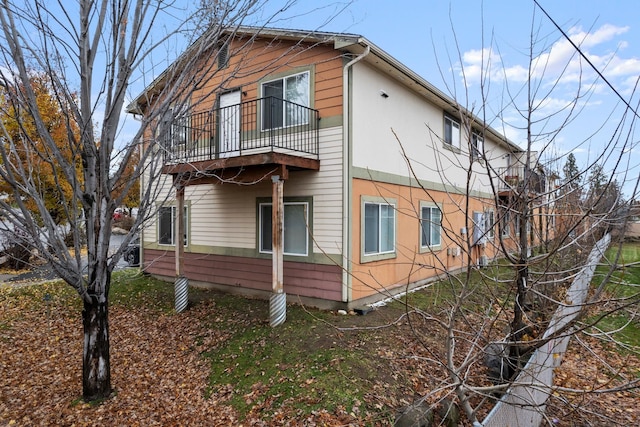 view of home's exterior featuring a balcony