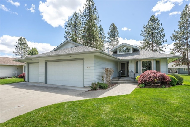 ranch-style house with a front yard and a garage