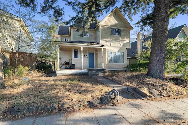 view of front of home featuring covered porch