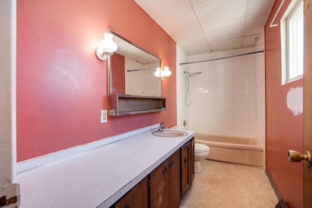 full bathroom with bathtub / shower combination, vanity, toilet, and tile patterned floors