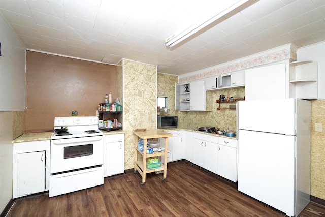 kitchen featuring white appliances, white cabinetry, light countertops, open shelves, and dark wood finished floors