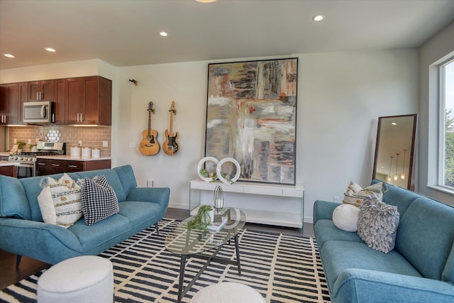 living room with dark hardwood / wood-style flooring