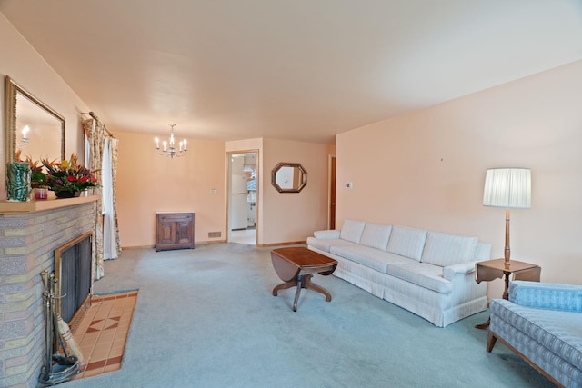 carpeted living room with a fireplace and a chandelier