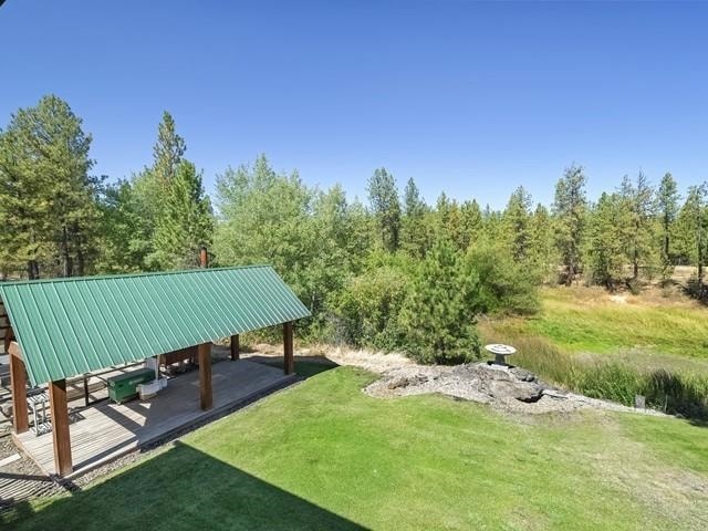 view of home's community featuring a gazebo and a yard