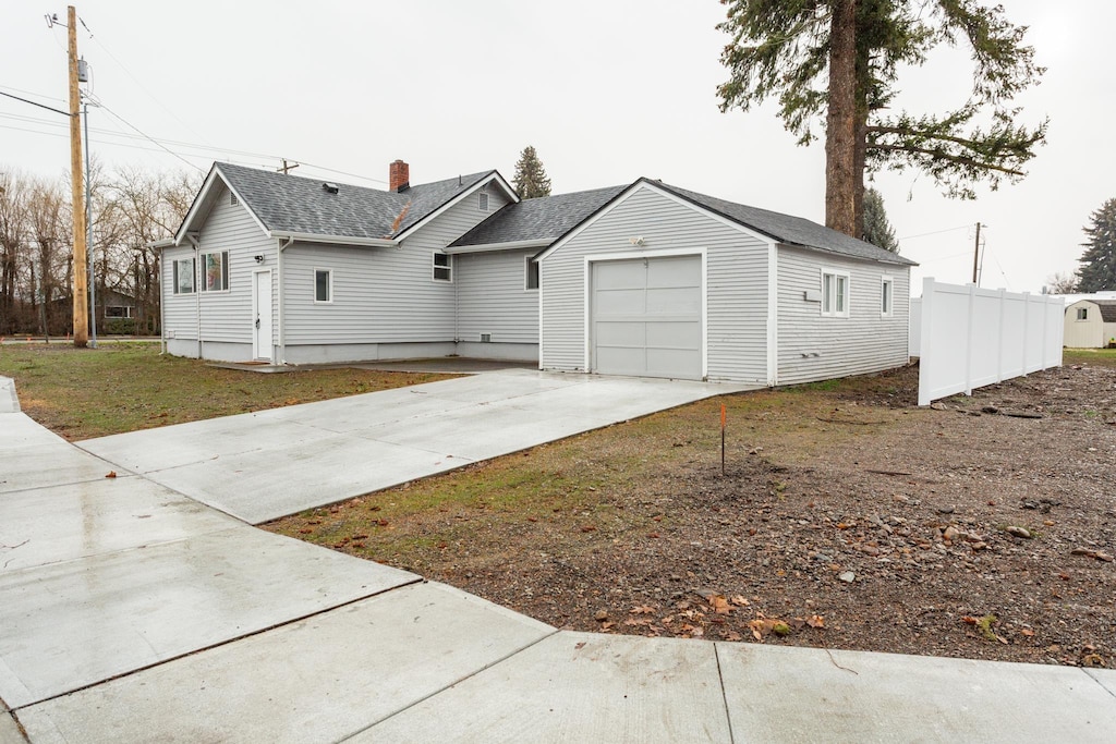 view of property exterior with a yard