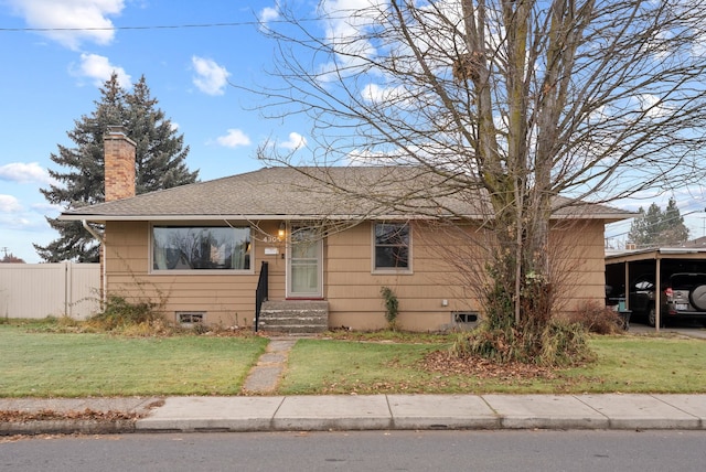 view of front facade with a front yard