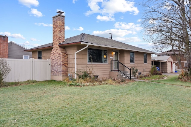 view of front of property with a front lawn