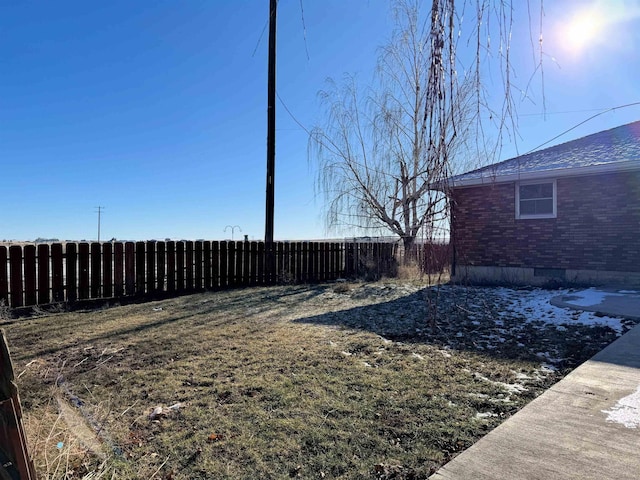 view of yard with fence