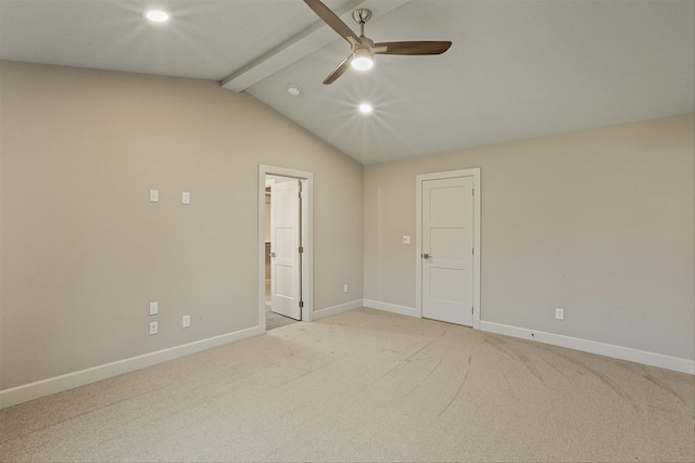 carpeted empty room featuring lofted ceiling with beams and ceiling fan