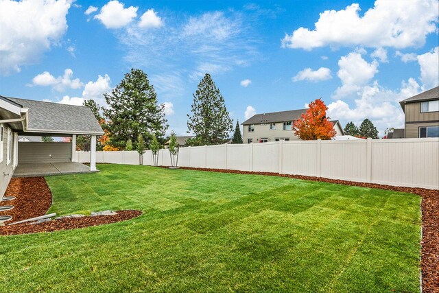 16924 E 16th Ln, Spokane Valley, WA 99037 - view of yard with a patio area