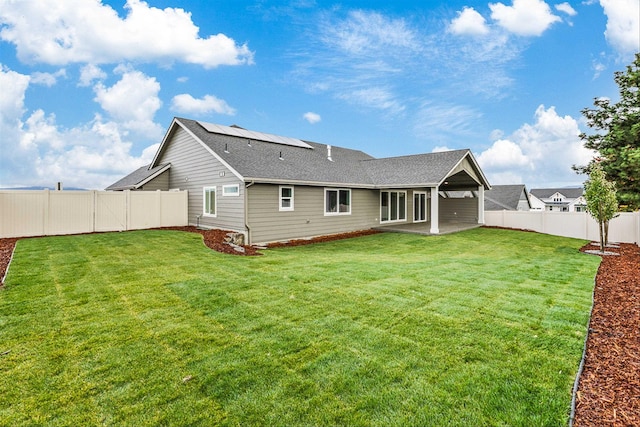 16924 E 16th Ln, Spokane Valley, WA 99037 - back of house with a patio area and a shingled roof