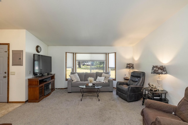 living room featuring electric panel, light carpet, and lofted ceiling