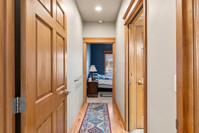 hallway featuring light wood-type flooring