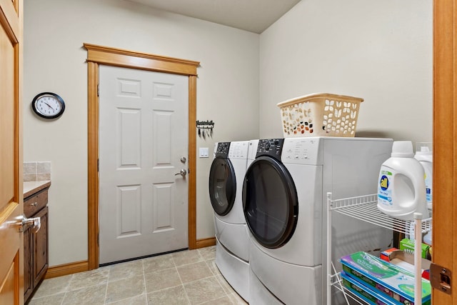 laundry area with washing machine and clothes dryer