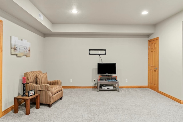 living area with carpet floors