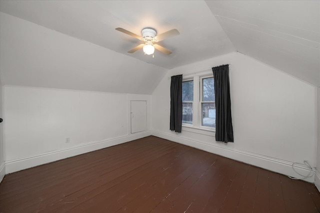 bonus room with dark hardwood / wood-style flooring, vaulted ceiling, and ceiling fan