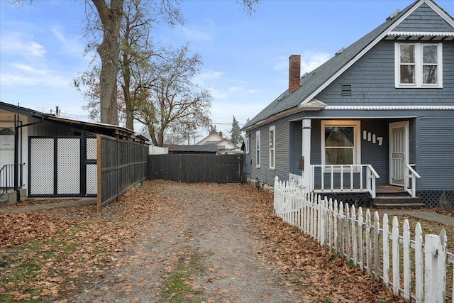 view of home's exterior with a porch