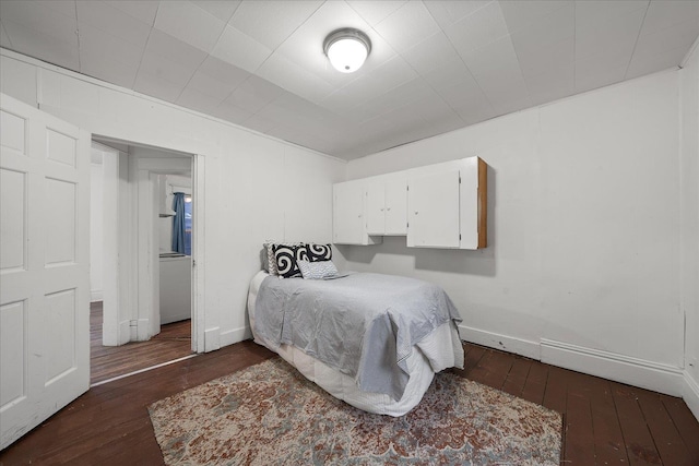 bedroom featuring dark hardwood / wood-style floors