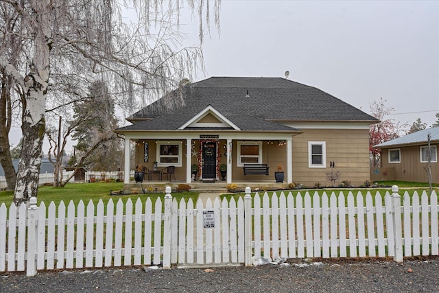 exterior space with a lawn and covered porch