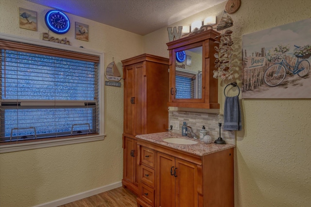 kitchen with tile countertops, crown molding, sink, and stainless steel appliances