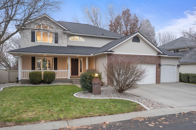 front facade with a front yard, a porch, and a garage