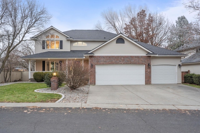 front facade with a garage and a front yard