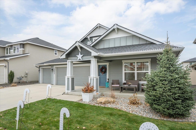 view of front facade featuring a front lawn and covered porch