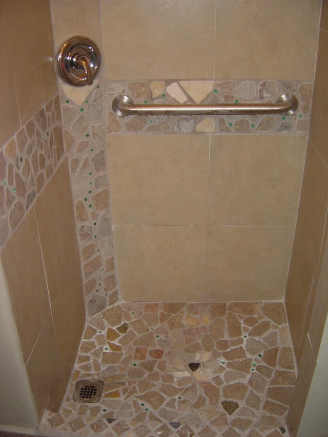 bathroom featuring walk in shower