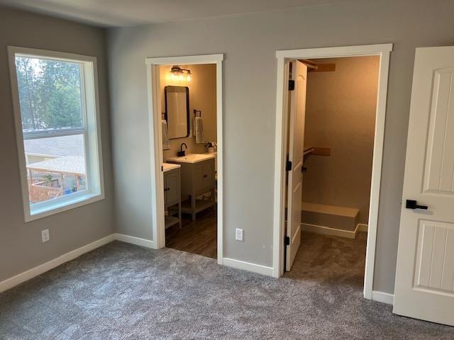 38105 N Frontage Rd, Elk, WA 99009 - unfurnished bedroom with carpet floors and connected bathroom