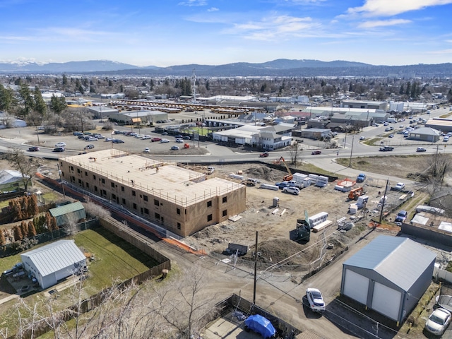 drone / aerial view featuring a mountain view