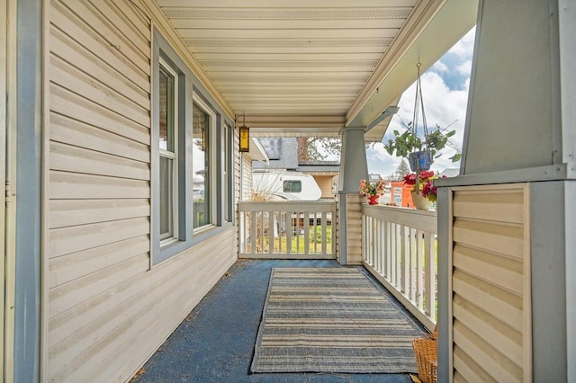 balcony featuring a porch