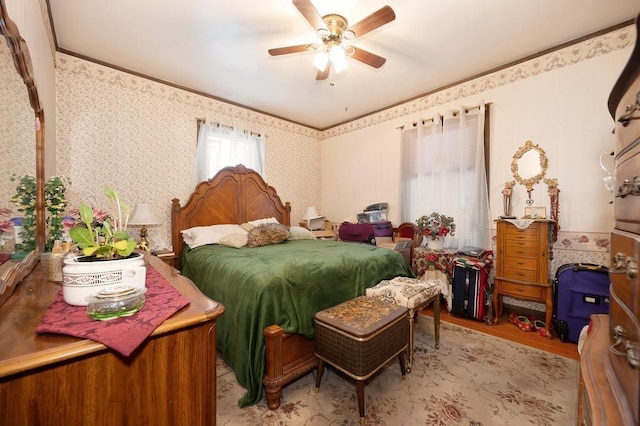 bedroom featuring light hardwood / wood-style flooring and ceiling fan