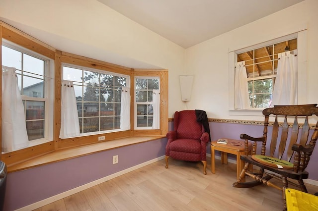 living area with light hardwood / wood-style flooring