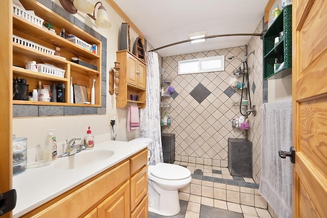 bathroom featuring toilet, a shower with curtain, vanity, and tile patterned floors