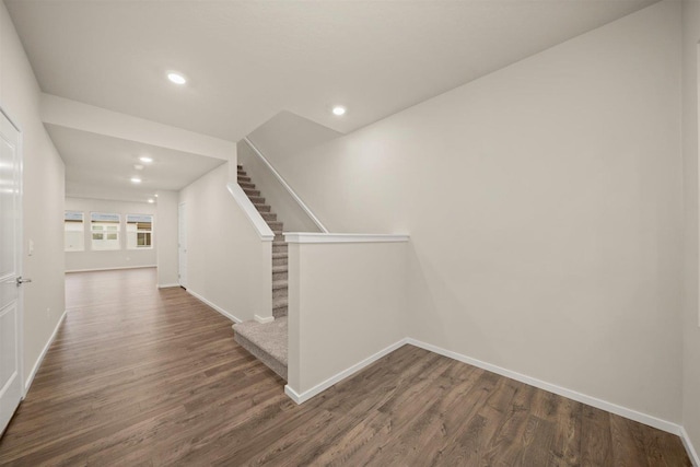 hallway featuring dark hardwood / wood-style floors